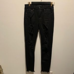 High-rise Black Distressed Skinny Jeans